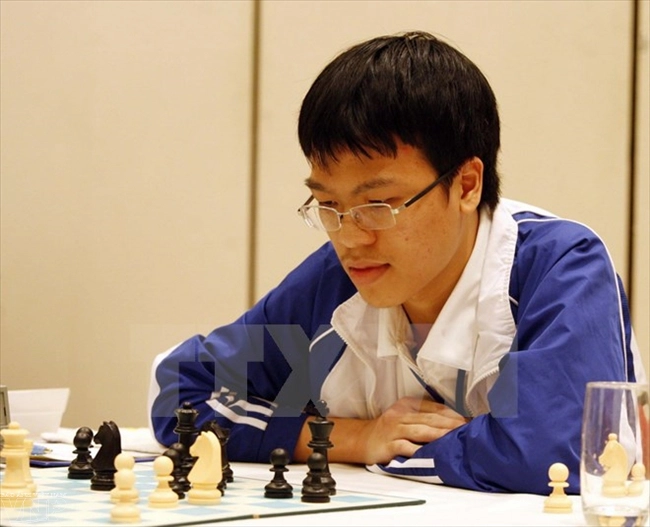 黎光廉与“国际象棋神童”并肩，帮助越南队创造重大赛事包揽全部金牌的奇迹